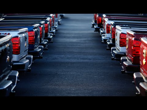 GM Cuts Hundreds of Workers as Ford Climbs Most in Three Years